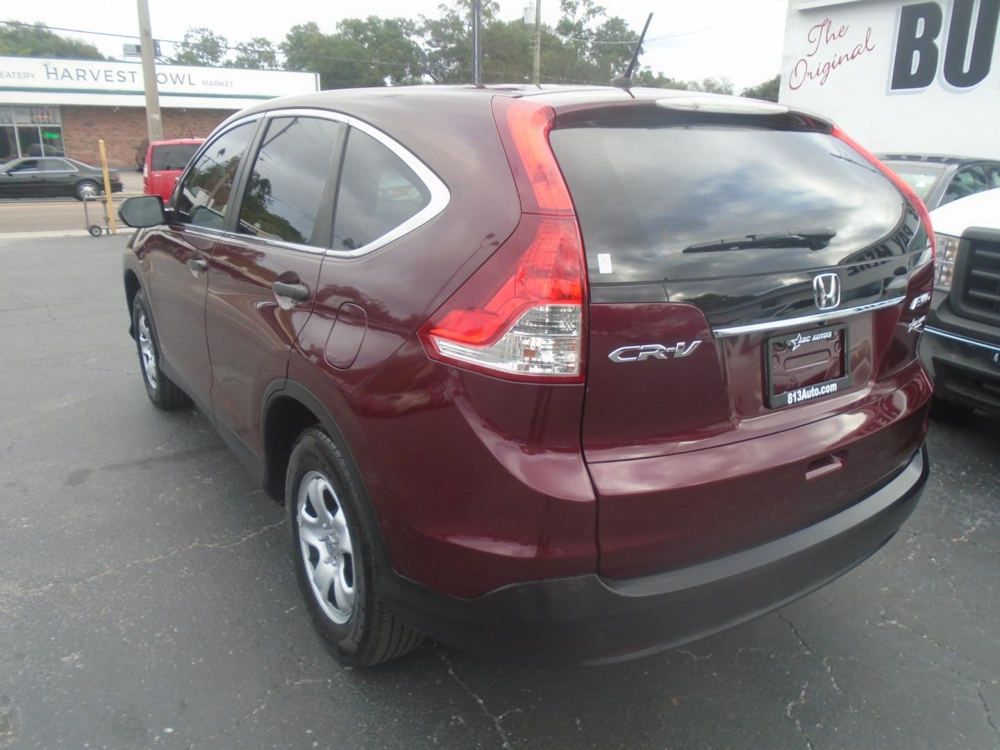 2014 Honda CR-V LX 4WD 5-Speed AT (5J6RM4H39EL) with an 2.4L L4 DOHC 16V engine, 5-Speed Automatic transmission, located at 6112 N Florida Avenue, Tampa, FL, 33604, (888) 521-5131, 27.954929, -82.459534 - Photo#4